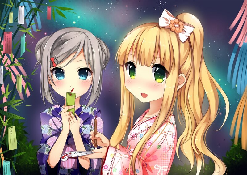 Two girls in kimonos at night