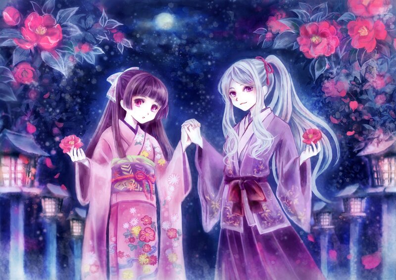 Two girls in kimonos at night
