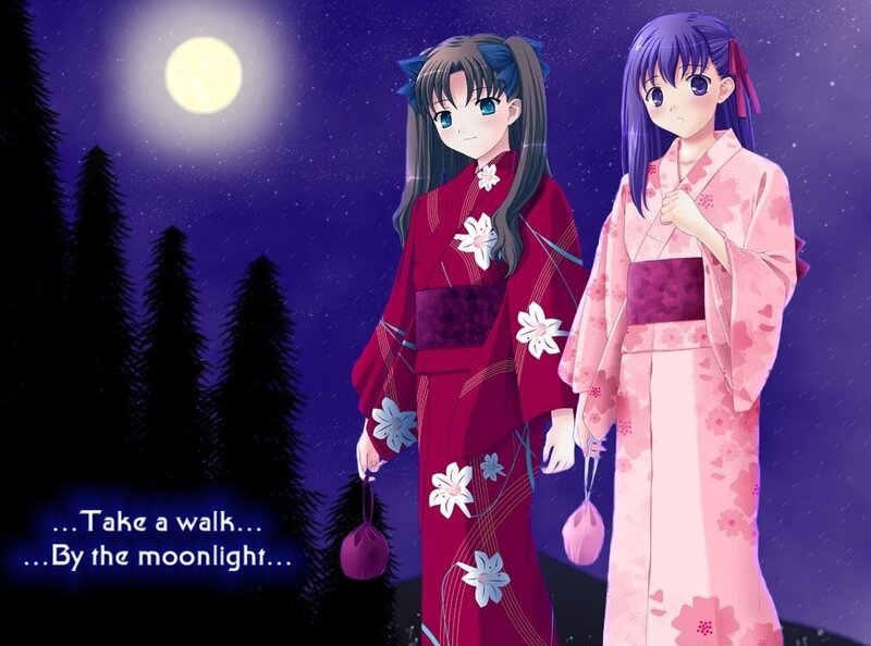 Two girls in kimonos at night