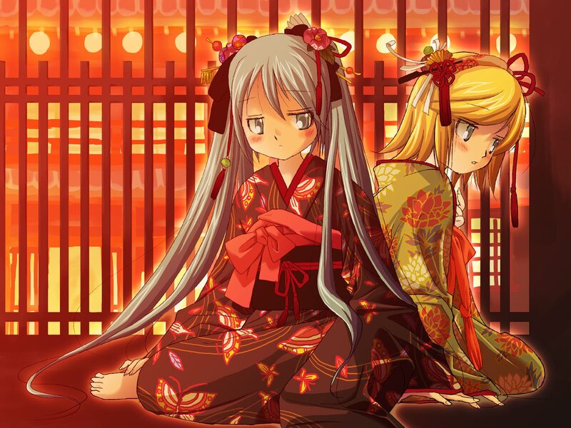 Two girls in kimonos at sunset