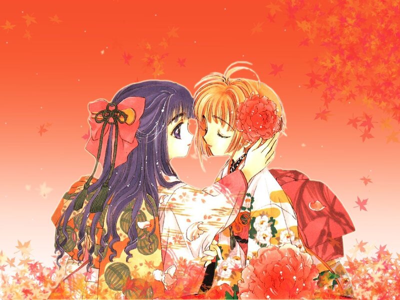 Two girls in kimonos embrace