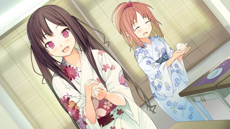 Two girls in kimonos making rice balls