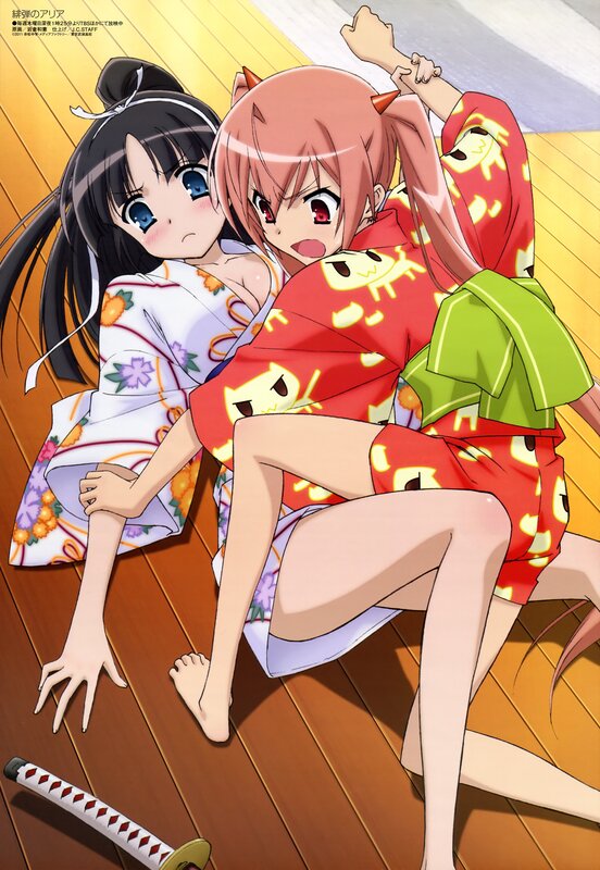 Two girls in kimonos on the floor