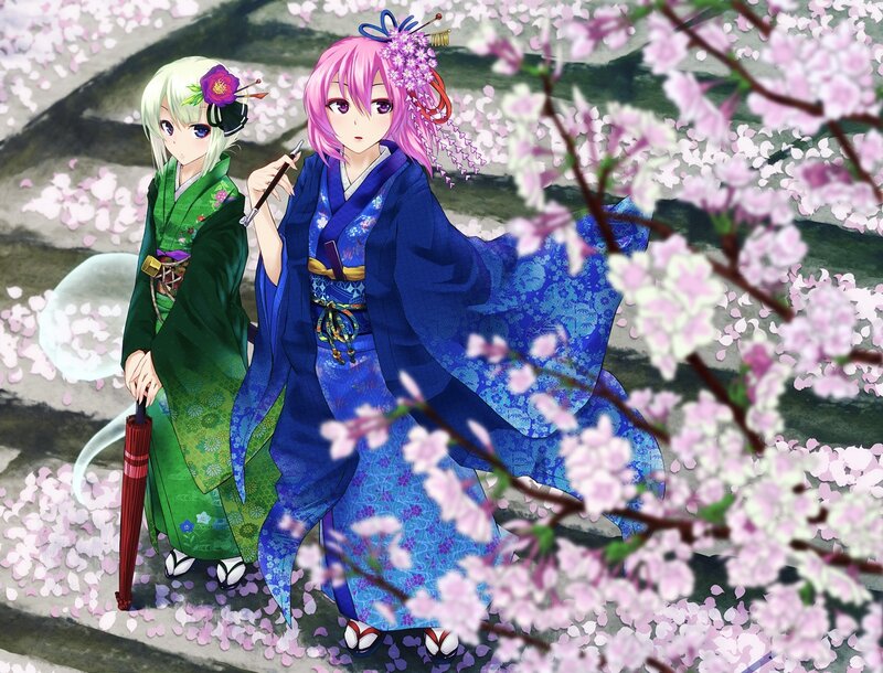Two girls in kimonos under cherry blossoms