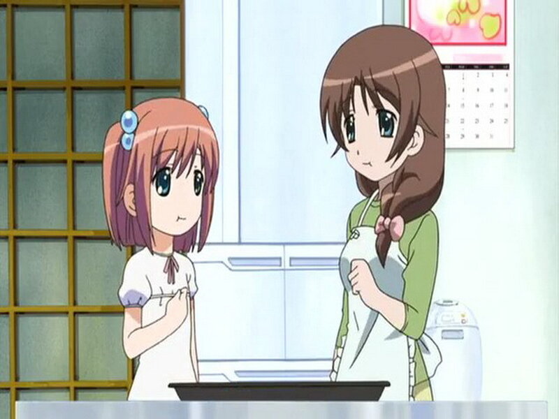 Two Girls in Kitchen — Brown