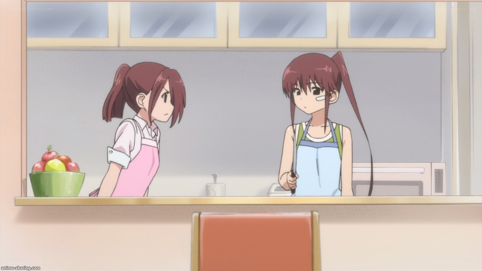 two girls in kitchen