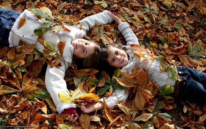 Two Girls in Leaves