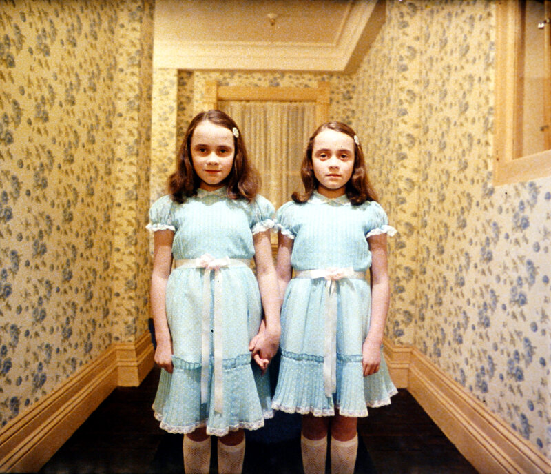 two girls in matching dresses