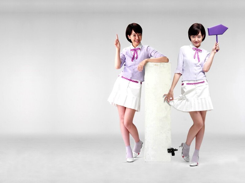 two girls in matching outfits