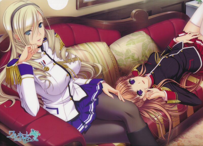 Two girls in military uniforms on a couch