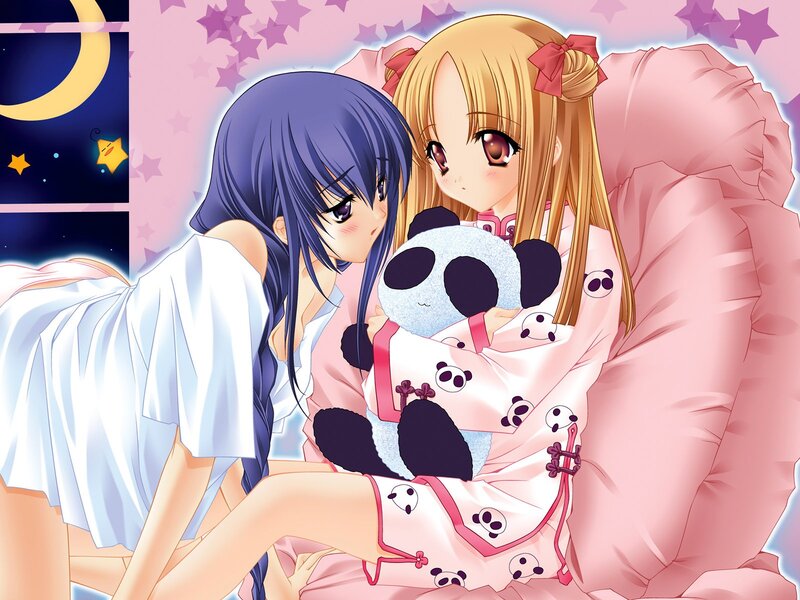 Two girls in pajamas at night