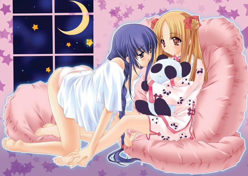 Two girls in pajamas at night