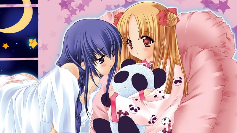 Two girls in pajamas at night