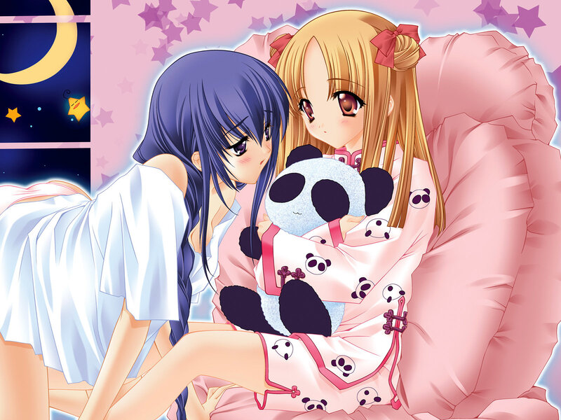 Two girls in pajamas at night