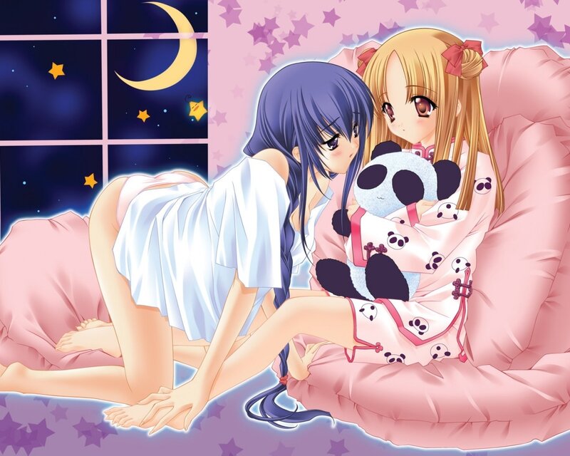 Two girls in pajamas at night