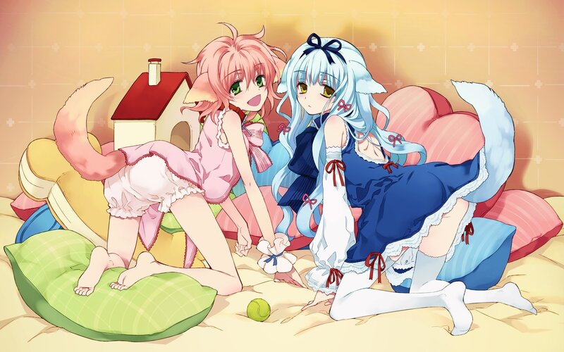 two girls in pajamas on pillows