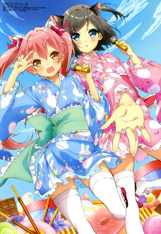 Two girls in pajamas with microphones