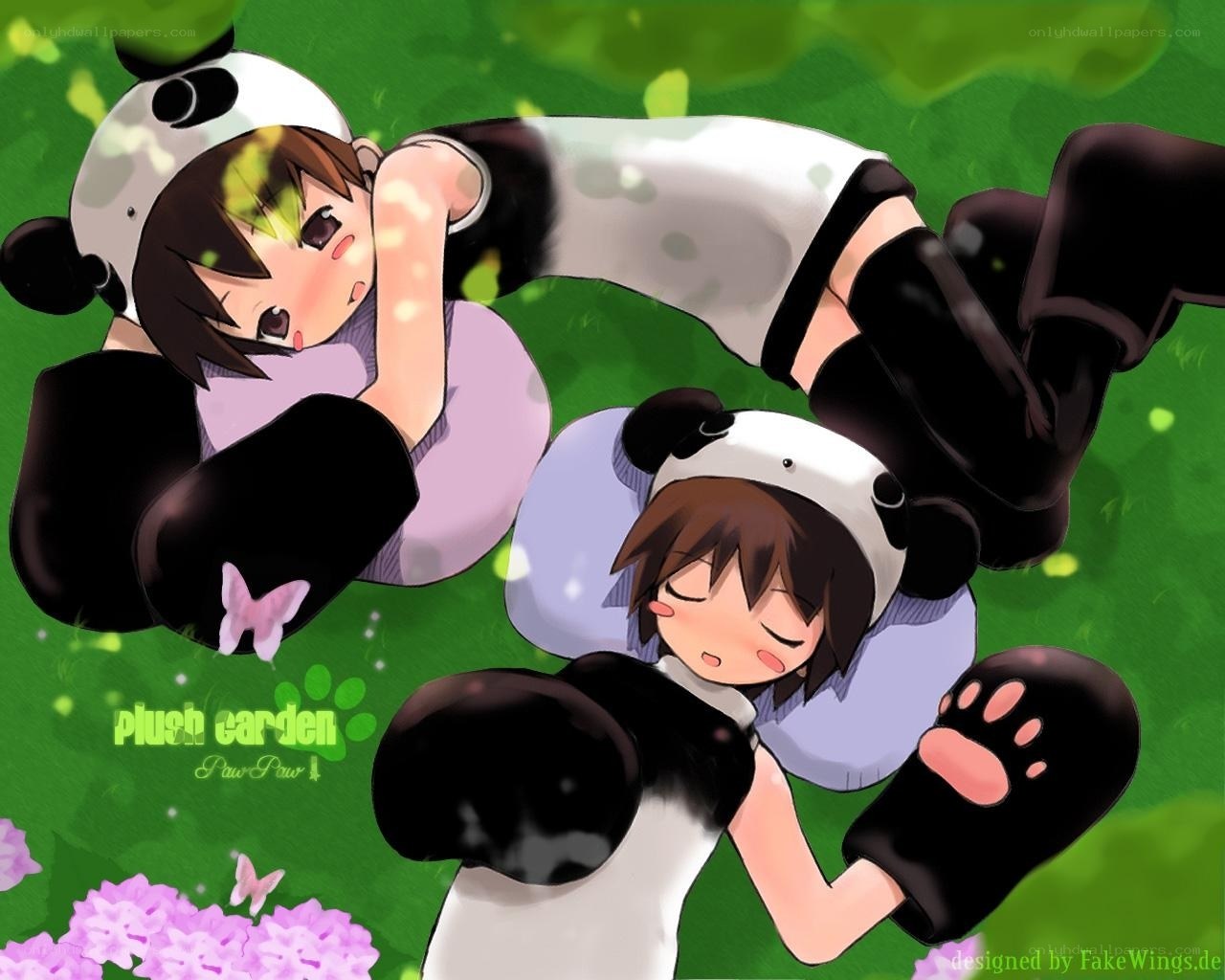 Two girls in panda costumes