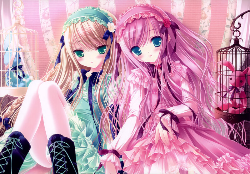 Two girls in pastel dresses