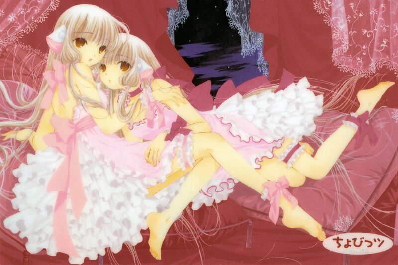 Two girls in pink dresses