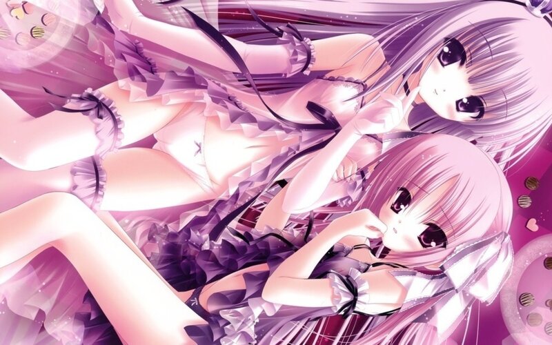 two girls in purple frilly outfits