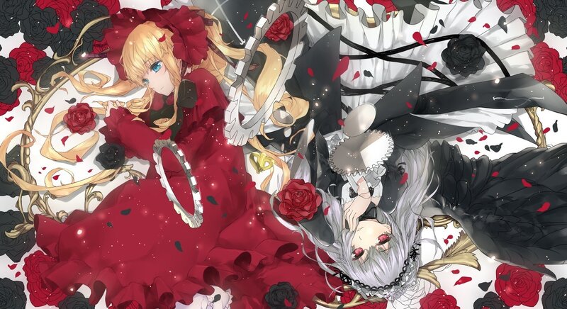 Two girls in red and black dresses