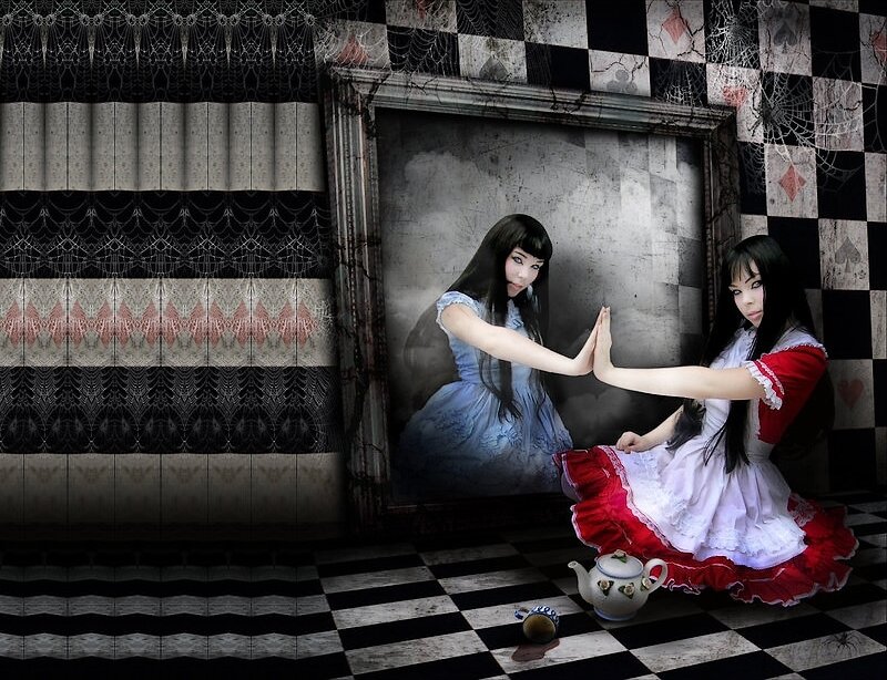 Two Girls in Red and Blue Dresses