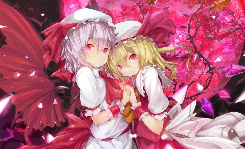 Two girls in red and white dresses