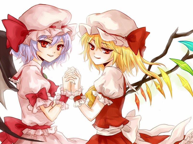 Two girls in red and white dresses