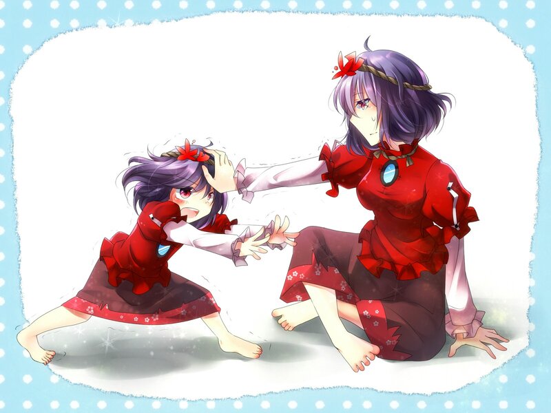 Two girls in red dresses