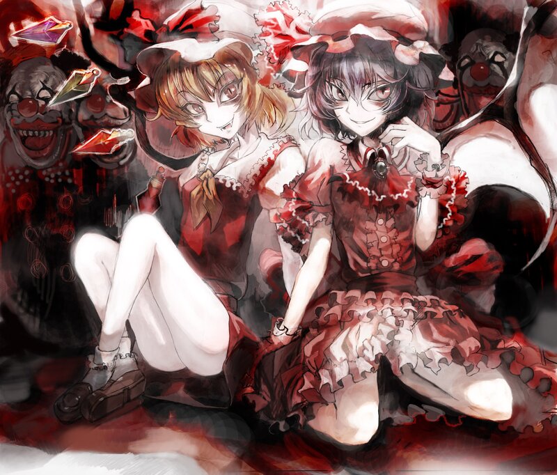 Two girls in red dresses with clowns