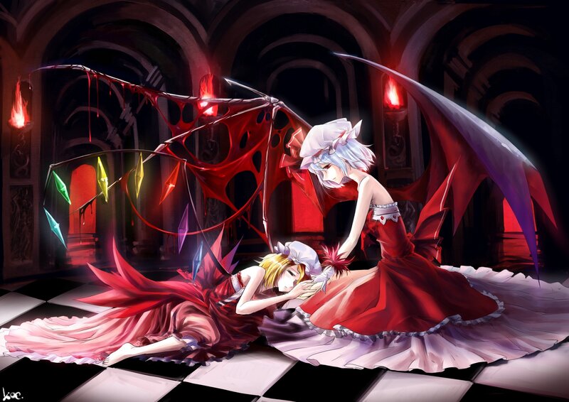 Two girls in red dresses with wings