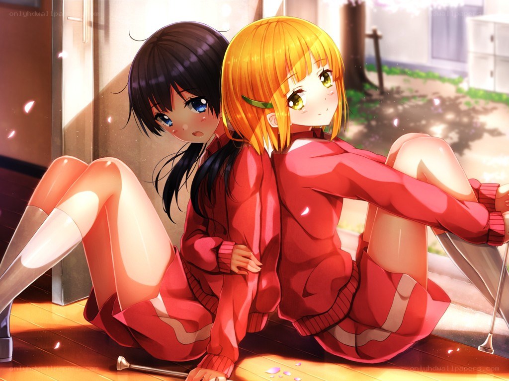 Two girls in red sweaters
