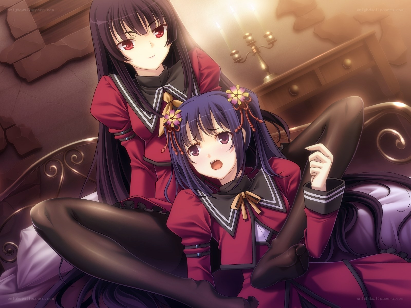 Two girls in red uniforms