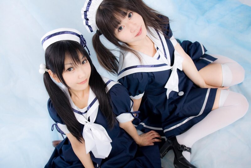 Two Girls in Sailor Uniforms — Blue, Playful
