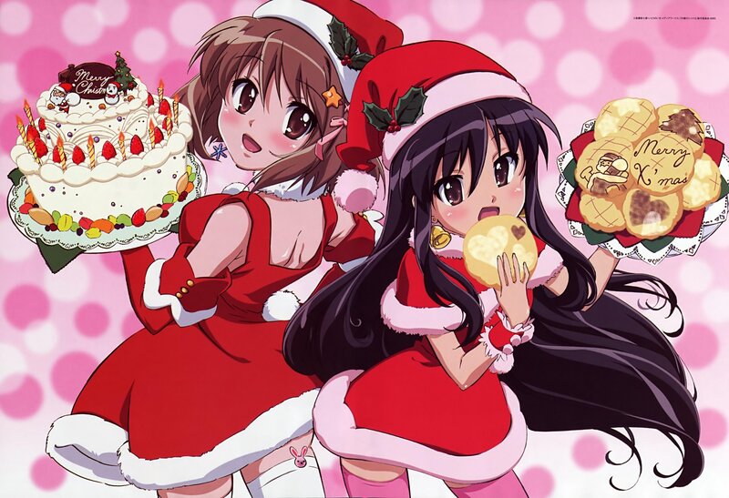 Two girls in Santa outfits