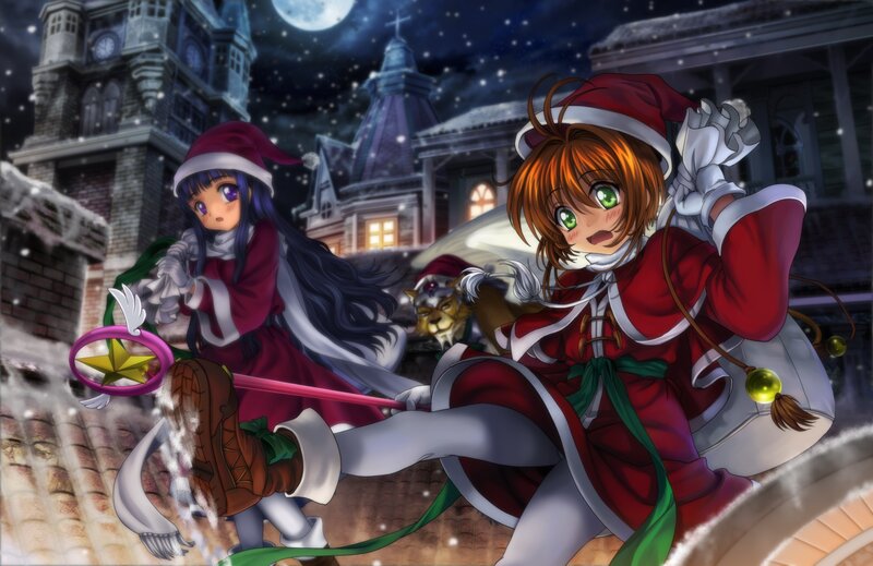 Two girls in Santa outfits