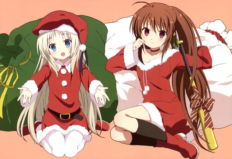 Two girls in Santa outfits