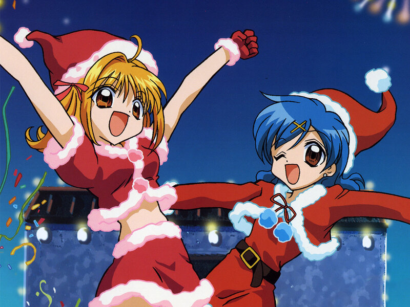 Two girls in Santa outfits