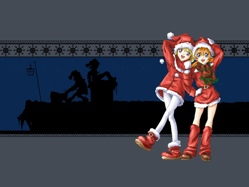 Two girls in Santa outfits