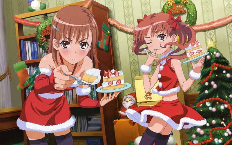 Two girls in Santa outfits