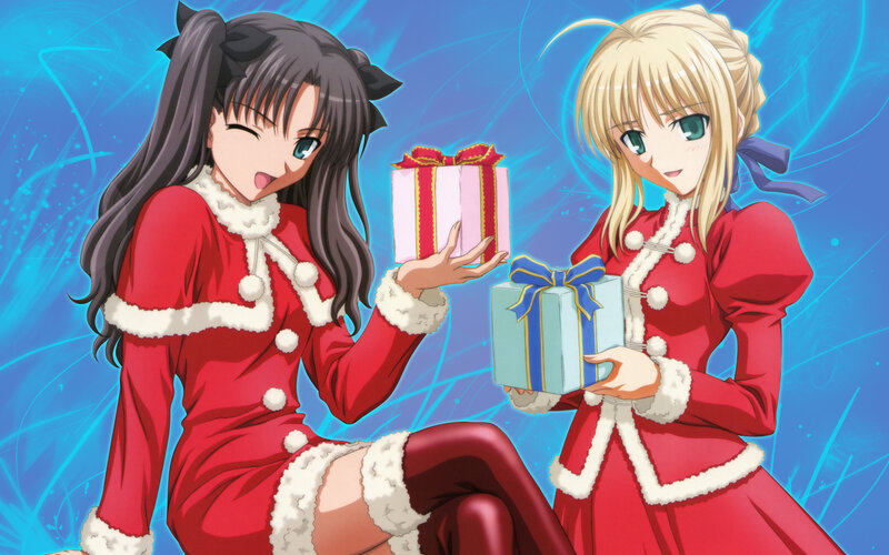 Two girls in Santa outfits