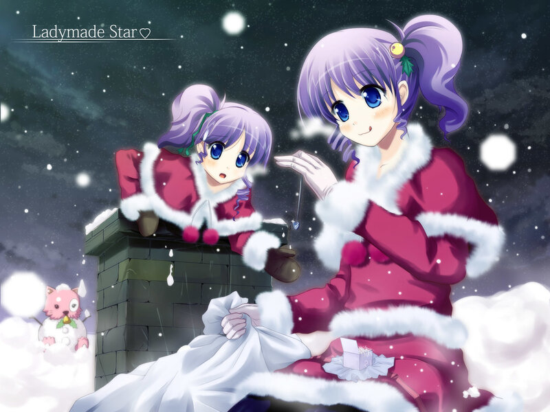 Two girls in Santa outfits