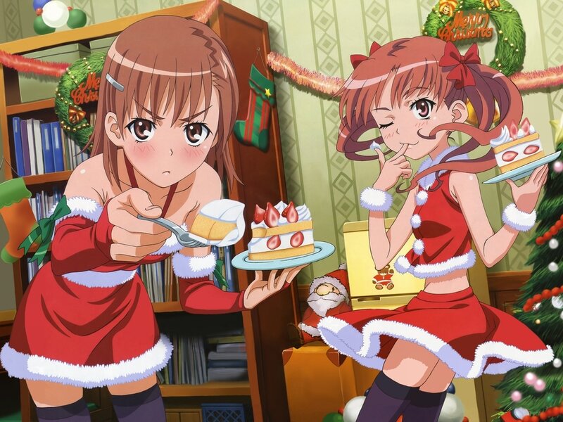 Two girls in Santa outfits