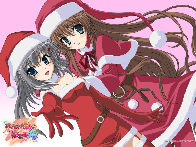 Two girls in Santa outfits