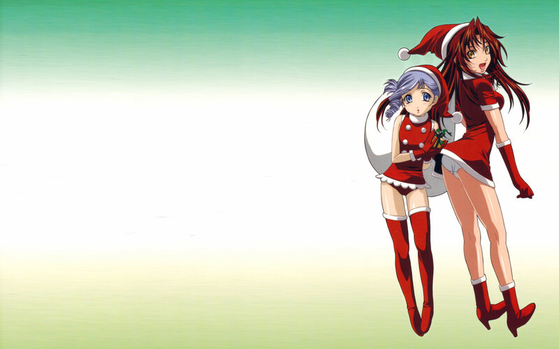 two girls in santa outfits