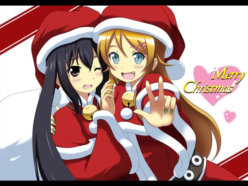 Two girls in Santa outfits