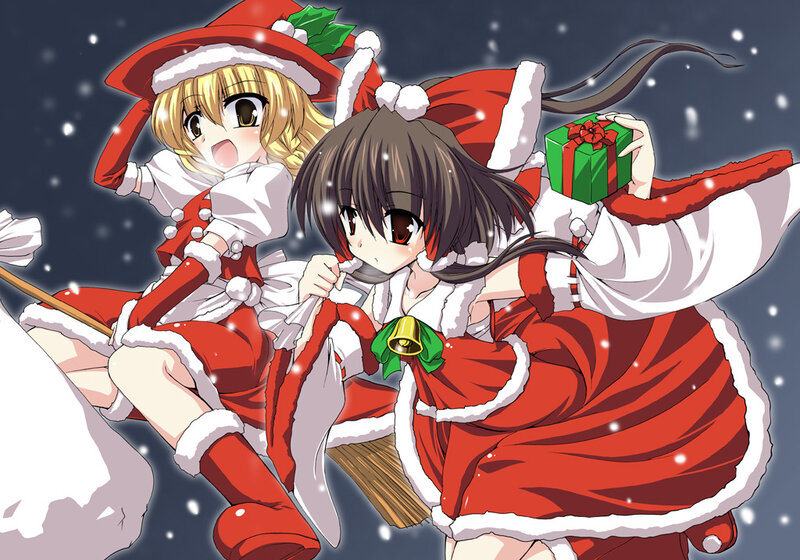 Two girls in Santa outfits