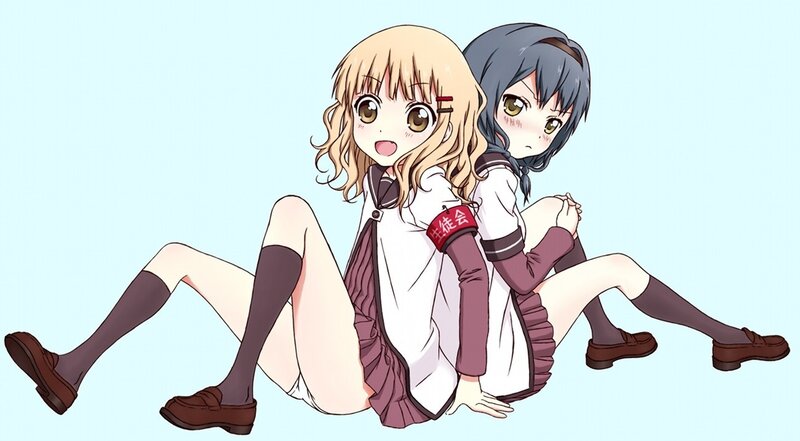 Two girls in school uniforms
