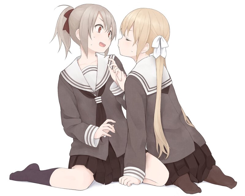 Two girls in school uniforms